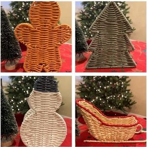 Set of 4 Christmas themed wicker baskets.